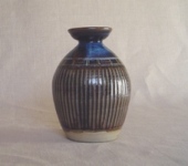 Tall black slip vase 1